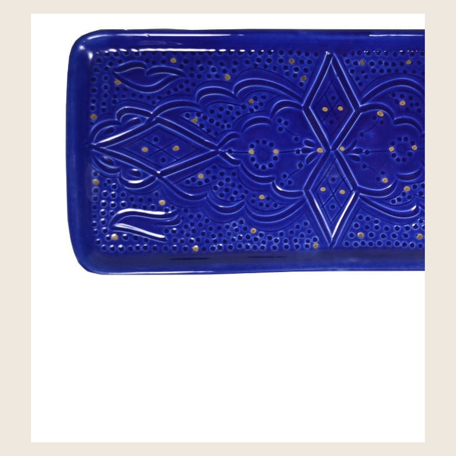 Rectangular ceramic plate with carved relief pattern, majorelle blue – handmade by Rachid in Safi, Morocco