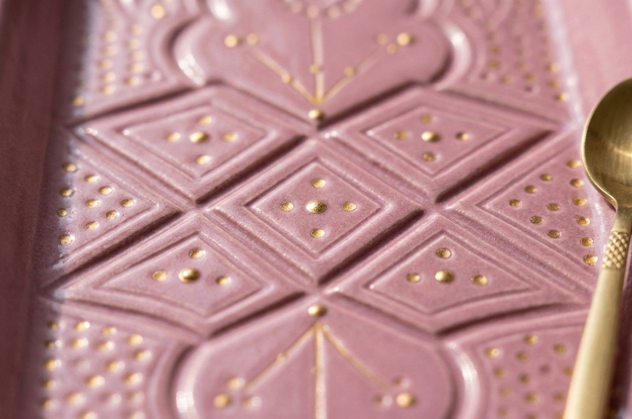 Rectangular ceramic plate with carved relief pattern, pink – handmade by Rachid in Safi, Morocco