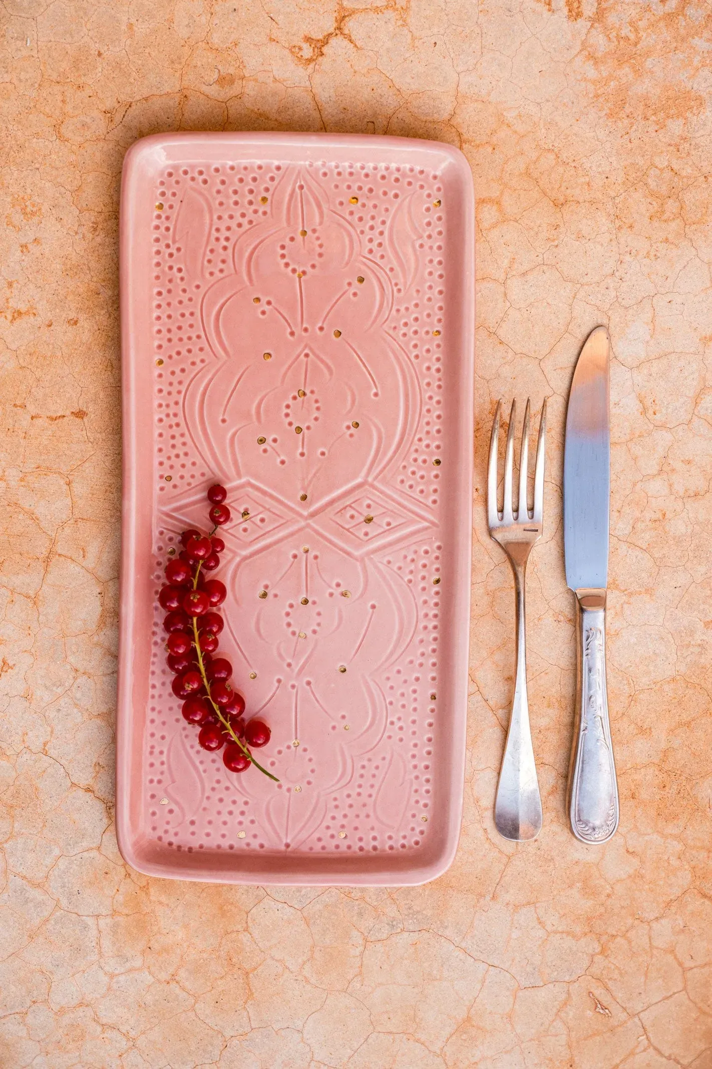 Rectangular ceramic plate with carved relief pattern, pink – handmade by Rachid in Safi, Morocco